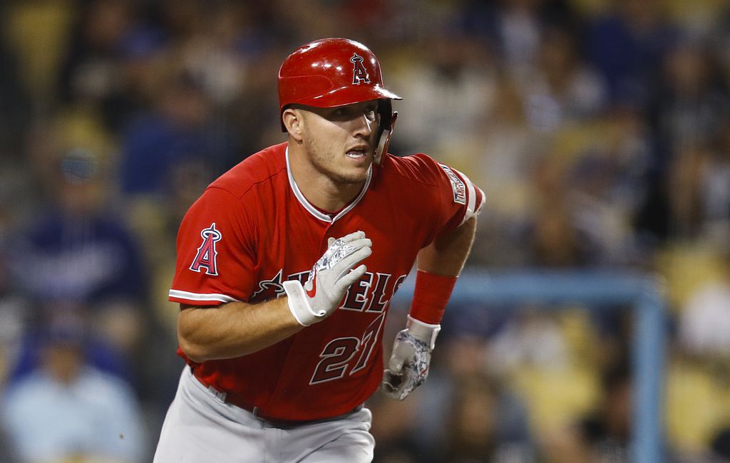 Los Angeles Angels' Mike Trout (27) runs to first base during a