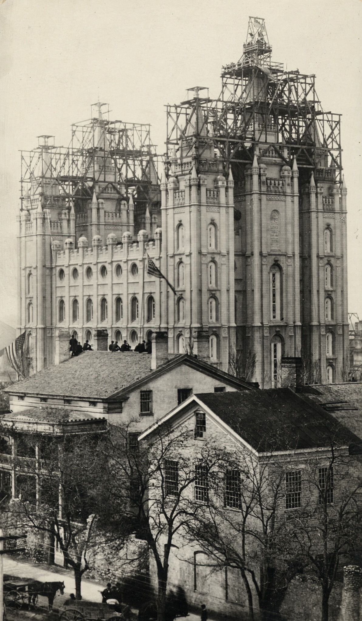 (photo courtesy The Church of Jesus Christ of Latter-day Saints) On April 6, 1892, a crowd of 30,000 people gathered around the Salt Lake Temple, with another 10,000 looking on from nearby streets, building roofs and trees, to witness the laying of the capstone.