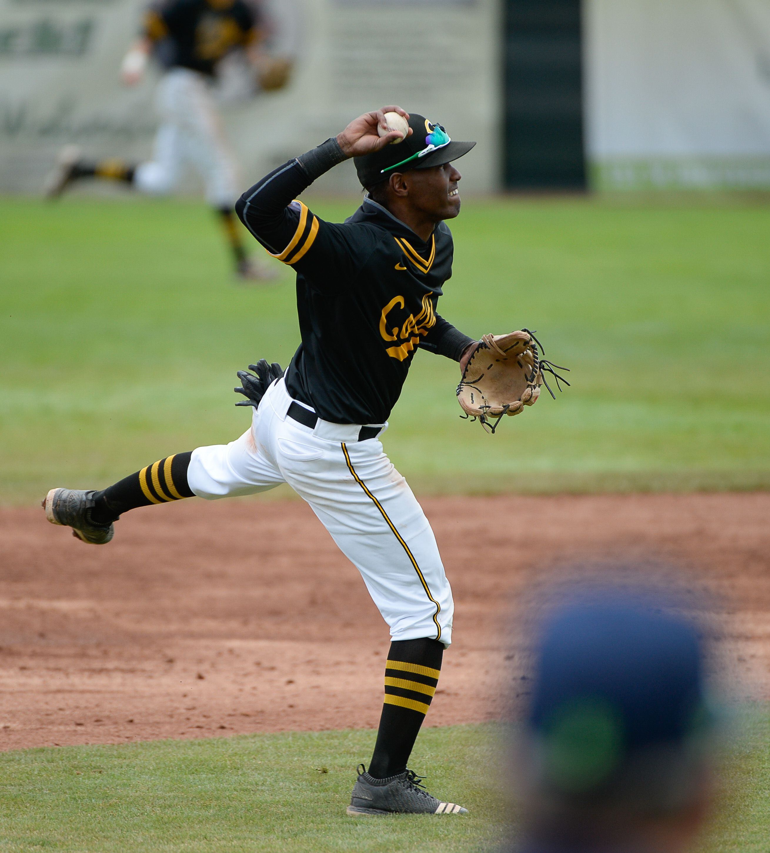 (Francisco Kjolseth | The Salt Lake Tribune) Daniel Gonzales of Cottonwood makes a play to first base against Timpanogos during the 5A baseball championship game at UCCU Stadium on the UVU campus in Orem, Friday, May 24, 2019.