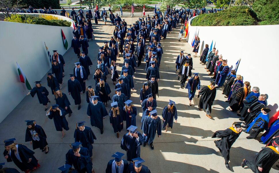 BYU graduates its biggest class ever with blue gowns, smiles and jokes