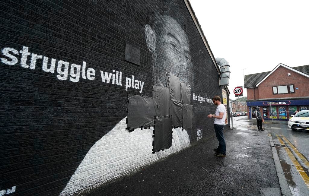 Defaced UK soccer star mural transformed into symbol of anti-racism