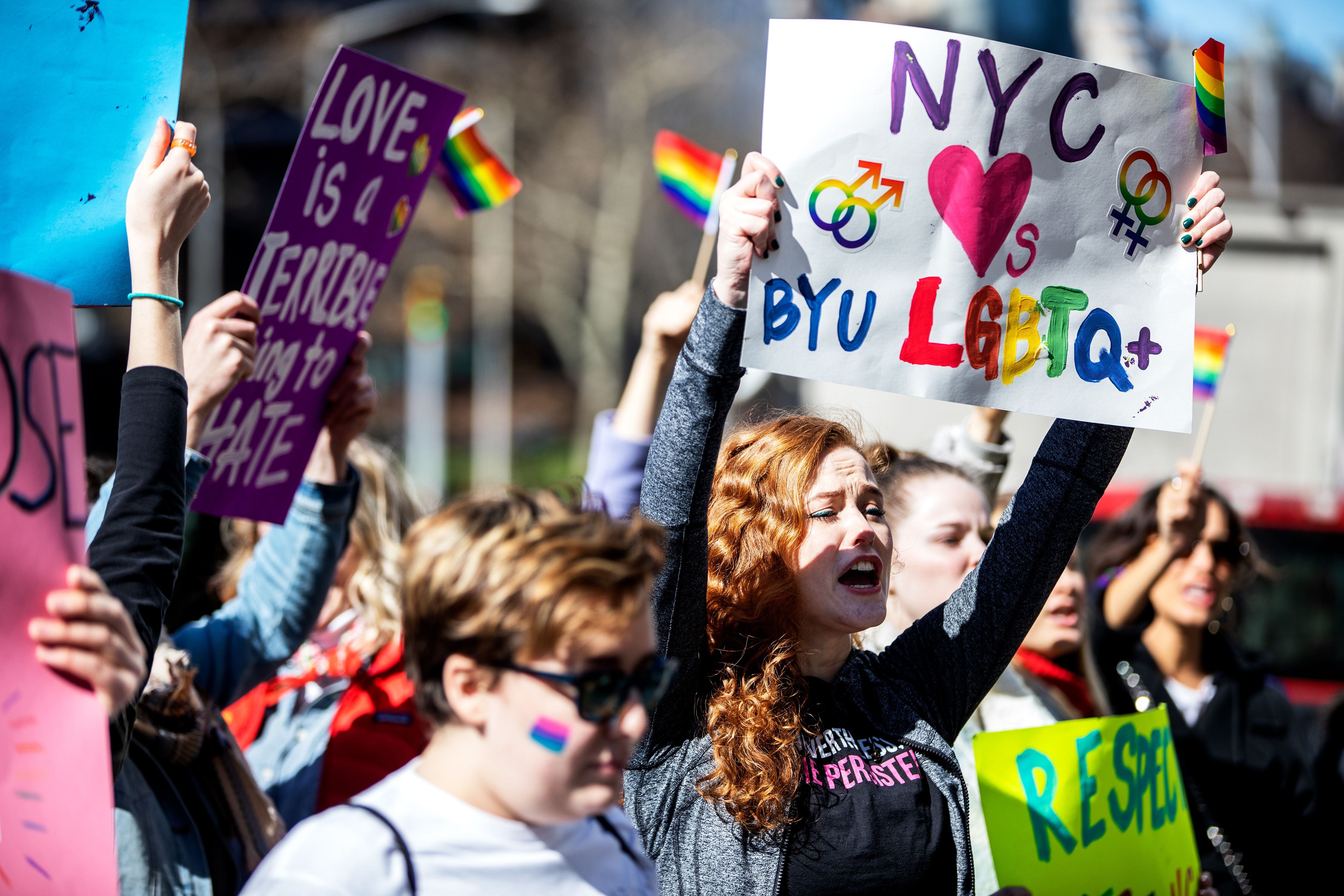 (Demetrius Freeman | for The Salt Lake Tribune) Current and former members of the Church of Jesus Christ of Latter-day Saints, the LGBTQ+ community, and supporters gather at Lincoln square across from the Mormon temple in Manhattan, New York, on March 7, 2020, to stand in solidarity with LGBTQ+ students who attending Brigham Young University. Brigham Young University reinstated homophobic policies in their student handbook that prohibit Òhomosexual behavior.Ó