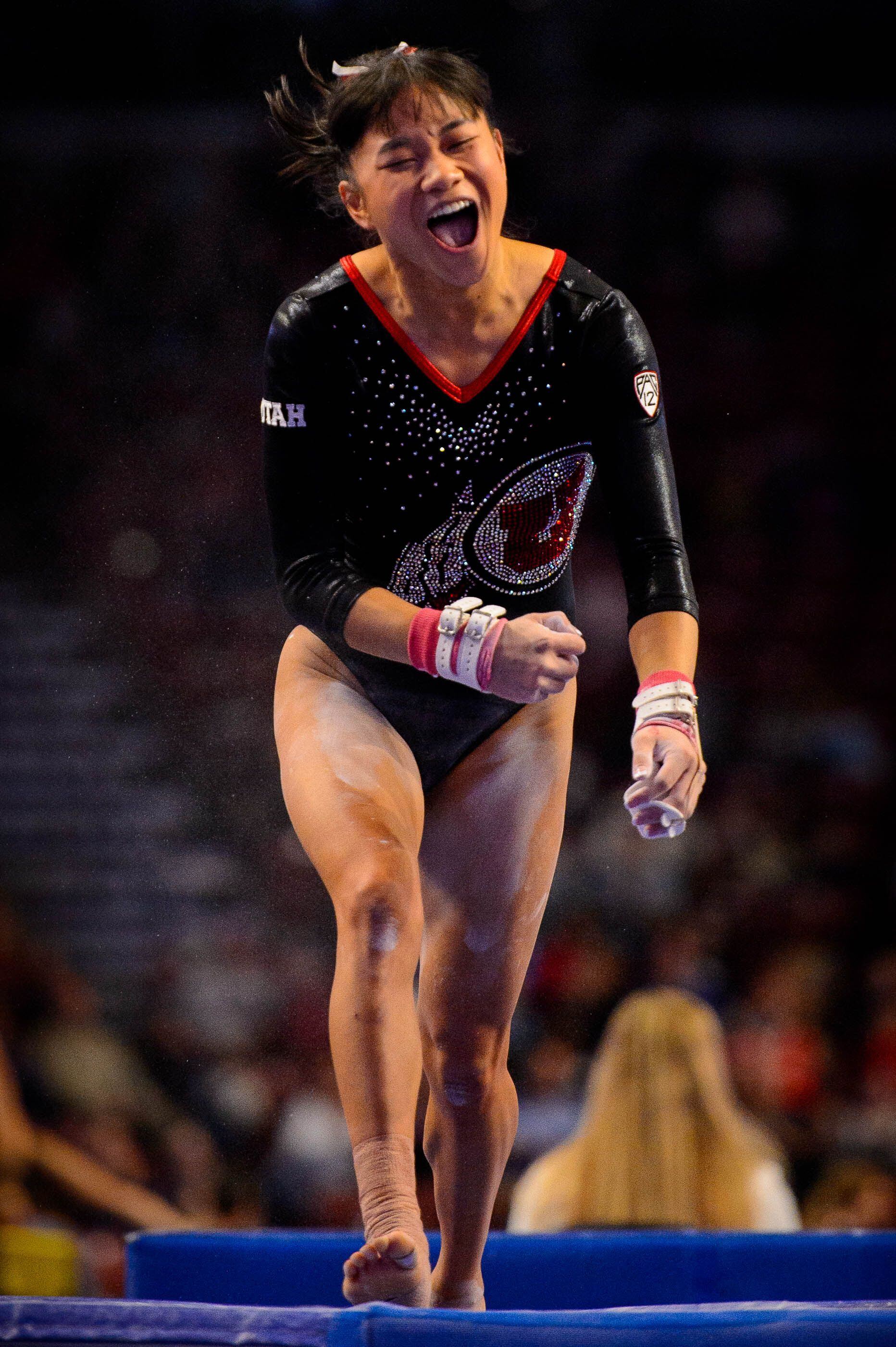 (Trent Nelson | The Salt Lake Tribune) Utah's Kim Tessen celebrates a 9.95 on the bars at the Best of Utah NCAA Gymnastics Meet in West Valley City on Saturday, Jan. 11, 2020.