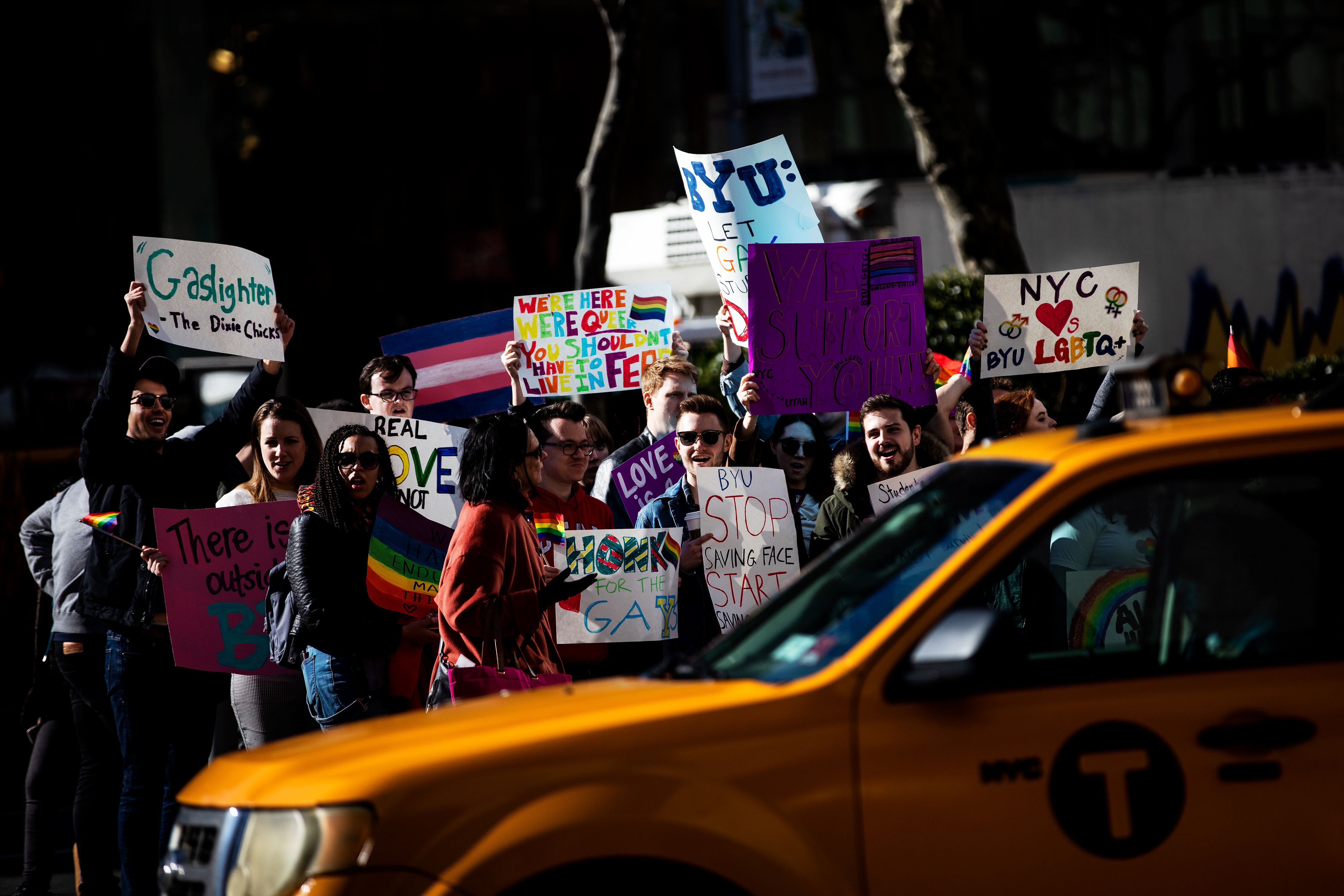 (Demetrius Freeman | for The Salt Lake Tribune) Current and former members of the Church of Jesus Christ of Latter-day Saints, the LGBTQ+ community, and supporters gather at Lincoln square across from the Mormon temple in Manhattan, New York, on March 7, 2020, to stand in solidarity with LGBTQ+ students who attending Brigham Young University. Brigham Young University reinstated homophobic policies in their student handbook that prohibit Òhomosexual behavior.Ó