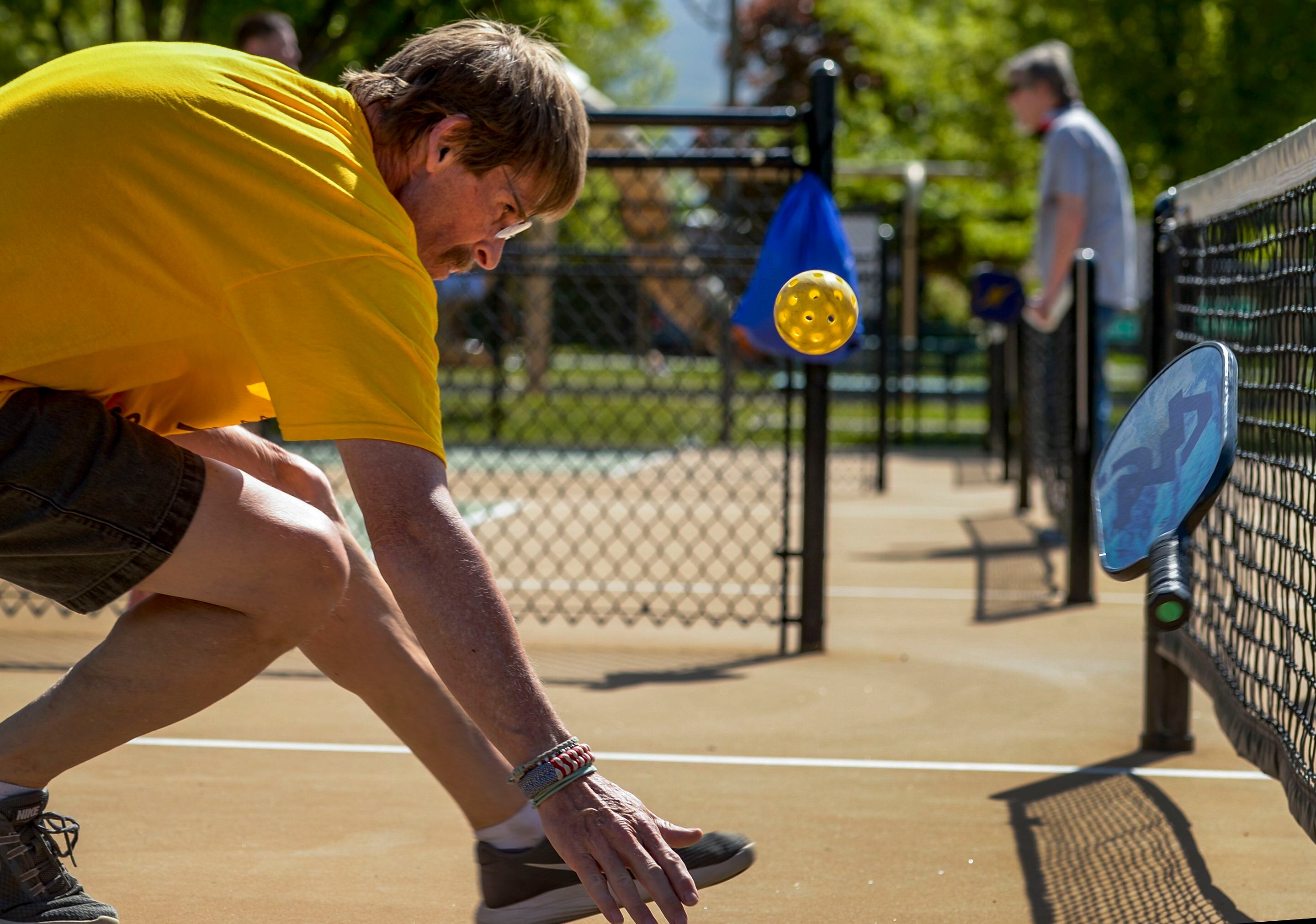 (Leah Hogsten | The Salt Lake Tribune) "They [Continue Mission] get me out and build my confidence," said Veteran Mark Meacham while making a dive to save a volley during pickleball at Hogan Park in Bountiful, May 14, 2019. Veteran suicide rates in Utah, are second highest, with the exception of Montana. The non-profit group Continue Mission serves the Veteran population to heal physical, mental, and emotional injuries through recreational programs like pickleball to promote health, mental well-being and positive life changing experiences.