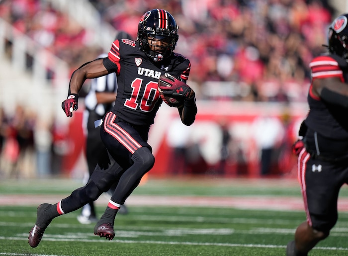 (Francisco Kjolseth  |  The Salt Lake Tribune) Utah Utes wide receiver Money Parks (10) runs the ball as the Utah Utes host the Arizona State Sun Devils in NCAA football in Salt Lake City on Saturday, Nov. 4, 2023.