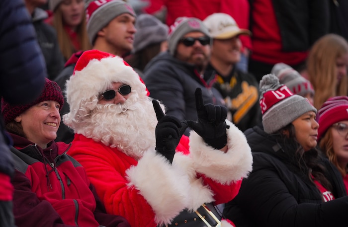 (Bethany Baker  |  The Salt Lake Tribune) A Utah Utes fan is seen dressed as Santa Claus during the game against the Colorado Buffaloes at Rice-Eccles Stadium in Salt Lake City on Saturday, Nov. 25, 2023.