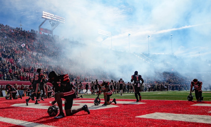 (Francisco Kjolseth  |  The Salt Lake Tribune) Utah players take a knee before the start of their game against the Arizona State Sun Devils in Salt Lake City on Saturday, Nov. 4, 2023.