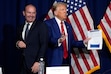 (Evan Vucci | AP) Republican presidential nominee former President Donald Trump participates in a roundtable talks after a roundtable with faith leaders as Sen. Mike Lee, R-Utah, smiles Sunday, Oct. 13, 2024, in Prescott Valley. Ariz.