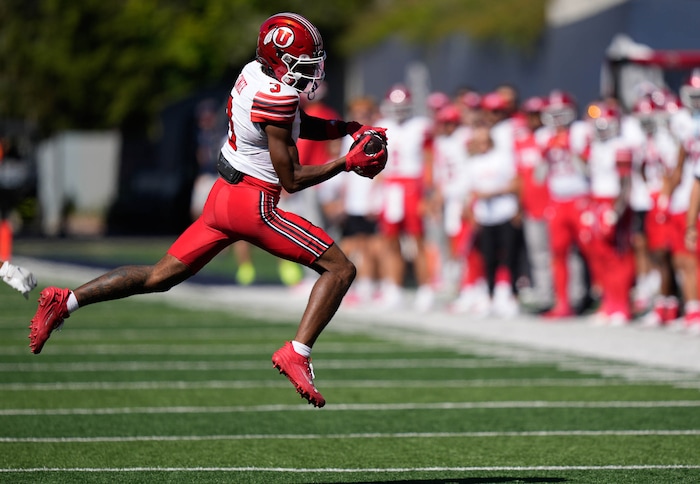 (Francisco Kjolseth  | The Salt Lake Tribune) Utes wide receiver Dorian Singer (3) hauls in a long pass as Utah State hosts the University of Utah during the first half of an NCAA college football game Saturday, Sept. 14, 2024, in Logan, Utah.