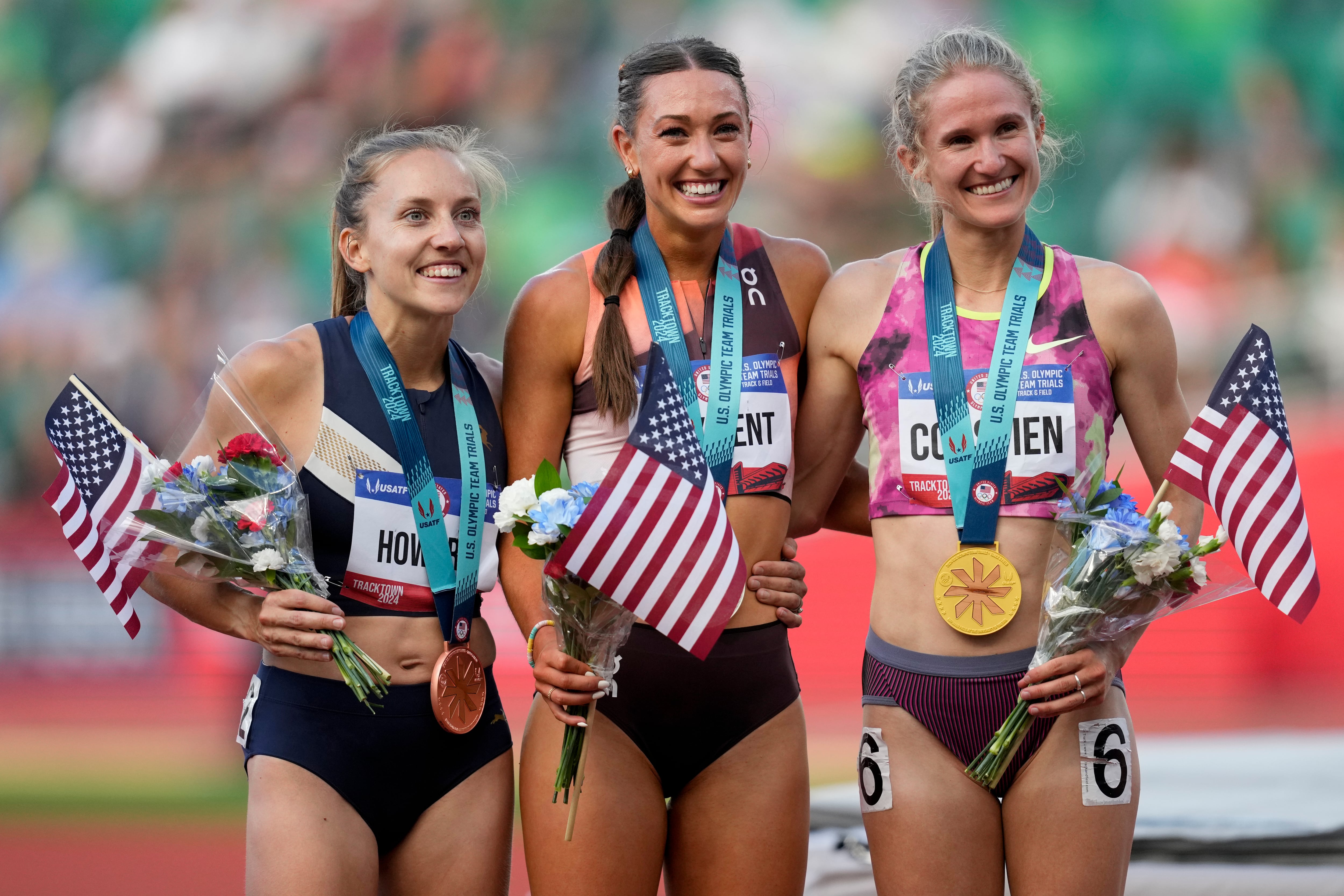 (Charlie Neibergall | AP) From right, Valerie Constien, Courtney Wayment and Marisa Howard pose after the women's 3000-meter steeplechase final during the U.S. Track and Field Olympic Team Trials Thursday, June 27, 2024, in Eugene, Ore.