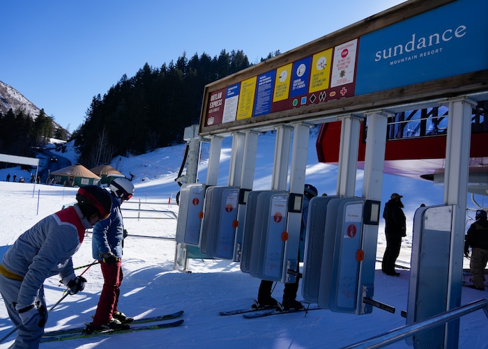 (Bethany Baker  |  The Salt Lake Tribune) Skiers wait in line for the lift at Sundance Resort near Provo on Thursday, Dec. 14, 2023.