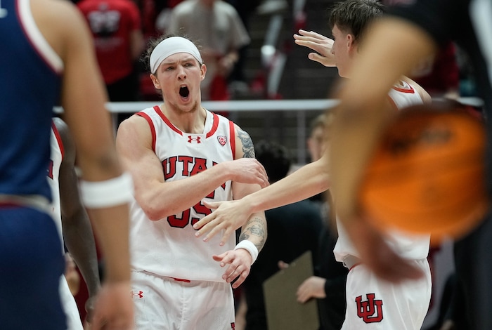 (Francisco Kjolseth  |  The Salt Lake Tribune) Utah Utes guard Gabe Madsen (55) screams in celebration forcing the first of three overtimes in PAC-12 basketball action between the Utah Utes and the Arizona Wildcats at the Jon M. Huntsman Center, on Thursday, Feb. 8, 2024.