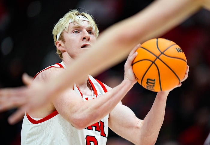 (Francisco Kjolseth  |  The Salt Lake Tribune) Utah Utes guard Hunter Erickson (0) looks for the pass in PAC-12 basketball action between the Utah Utes and the Arizona Wildcats at the Jon M. Huntsman Center, on Thursday, Feb. 8, 2024.