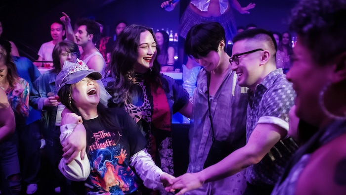 (Luka Cyprian  |  Sundance Institute) Kelly Marie Tran, Lily Gladstone, Han Gi-Chan and Bowen Yang, from left, star in Andrew Ahn's comedy "The Wedding Banquet," a remake of Ang Lee's 1993 movie, an official selection of the 2025 Sundance Film Festival, in the Premieres program.