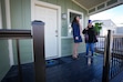 (Bethany Baker | The Salt Lake Tribune) Salt Lake City Mayor Erin Mendenhall, left, speaks with Lori McQueen, a new villager moving into her home at The Other Side Village in Salt Lake City on Monday, Dec. 30, 2024.