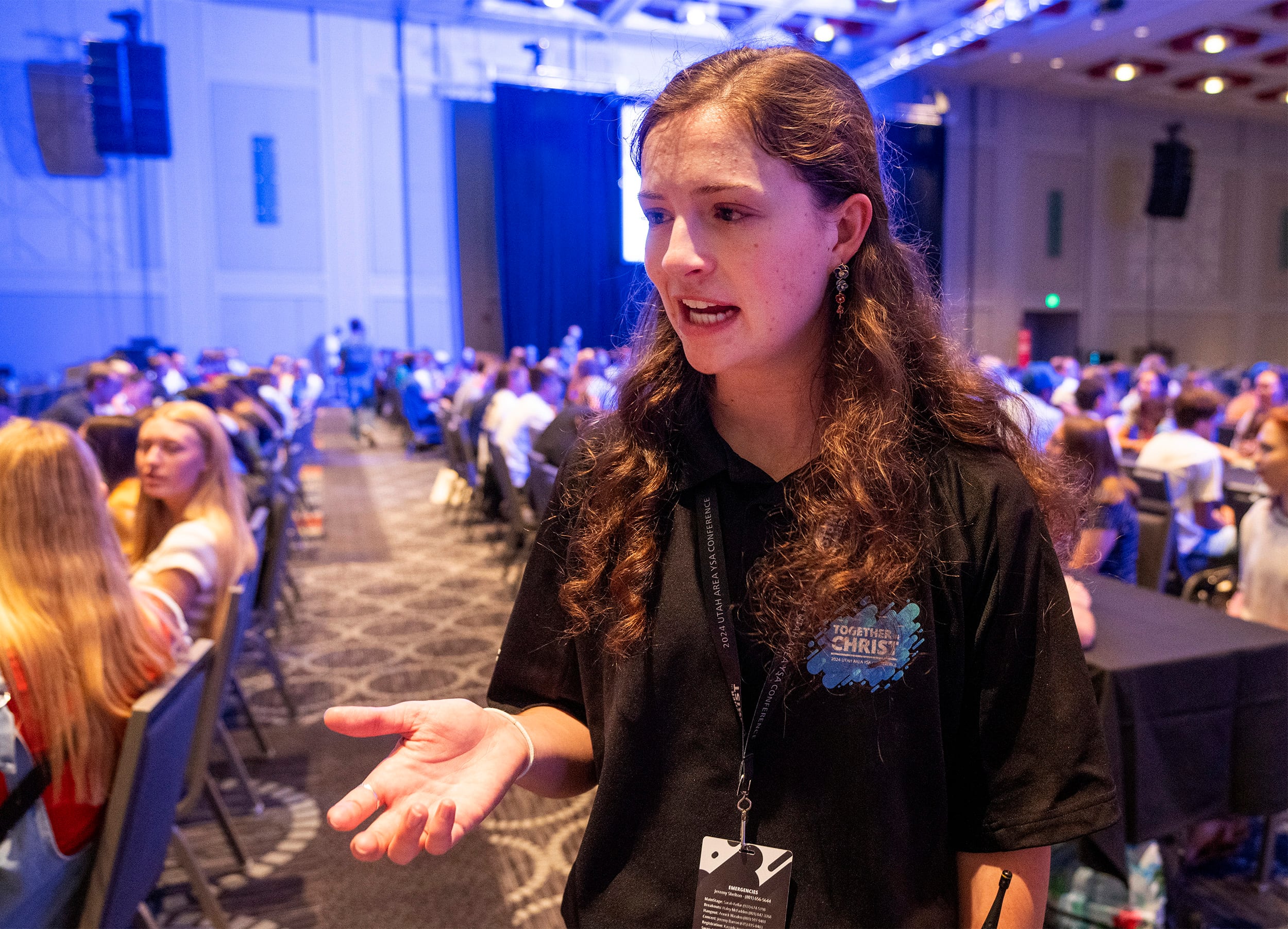 (Rick Egan | The Salt Lake Tribune) Carly Clark helps out at the Salt Palace for the 2024 Utah YSA Conference on Friday, Aug. 2, 2024.
