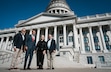 (Bethany Baker  |  The Salt Lake Tribune) Jim McConkie, left, Brent Ward, Christine Durham and Richard Lambert gather in front of the Utah Capitol on Thursday, Oct. 3, 2024, to announce "Latter-day Saints Opposed to Trump," an online petition calling on all church members to oppose Donald Trump.