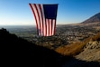 (Trent Nelson | The Salt Lake Tribune) The giant flag known as "The Major," honoring the legacy of Maj. Brent Taylor, flies above North Ogden on Friday, Nov. 8, 2024.