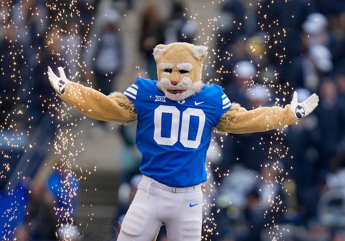 (Bethany Baker  |  The Salt Lake Tribune) Cosmo the Cougar performs for fans between quarters against the Oklahoma Sooners at LaVell Edwards Stadium in Provo on Saturday, Nov. 18, 2023.