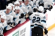 Utah Hockey Club's Jack McBain (22) returns to the bench after scoring during the first period of an NHL hockey game against the Pittsburgh Penguins, Saturday, Nov. 23, 2024, in Pittsburgh. (AP Photo/Gene J. Puskar)