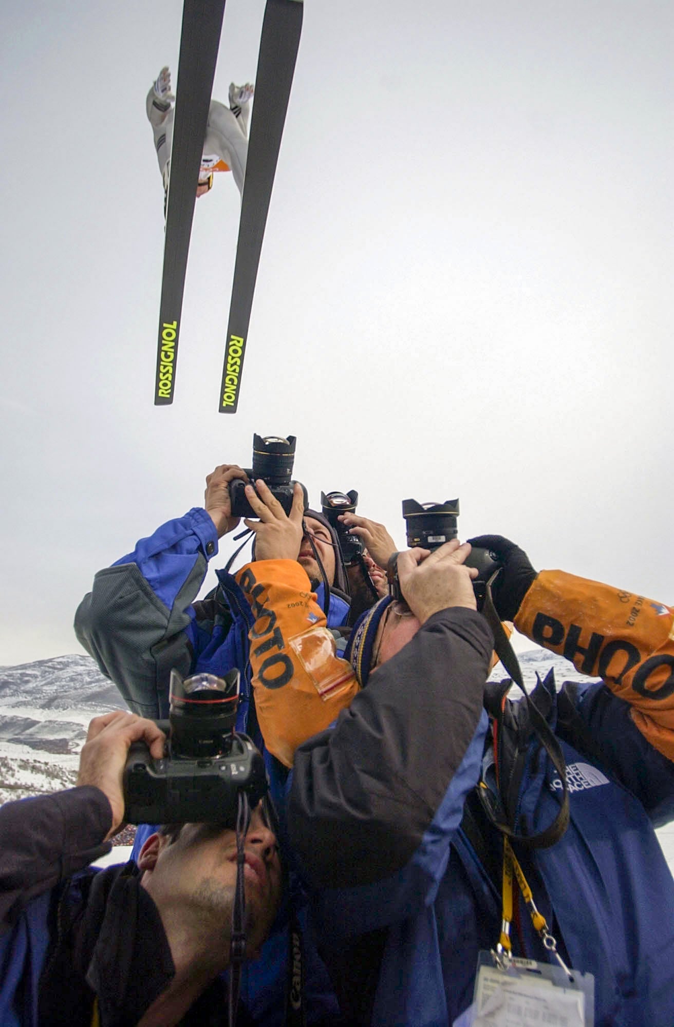 (Trent Nelson | The Salt Lake Tribune) Photographers positioned under the in-run during the ski jumping K120 team competition of the 2002 Winter Olympics Monday, Feb. 18, 2002 at Utah Olympic Park.