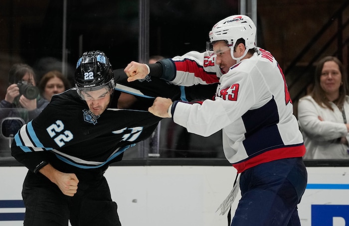 (Francisco Kjolseth  | The Salt Lake Tribune) Utah Hockey Club center Jack McBain (22) fights Washington Capitals right wing Tom Wilson (43) during an NHL hockey game at the Delta Center in Salt Lake City on Monday, Nov. 18, 2024.