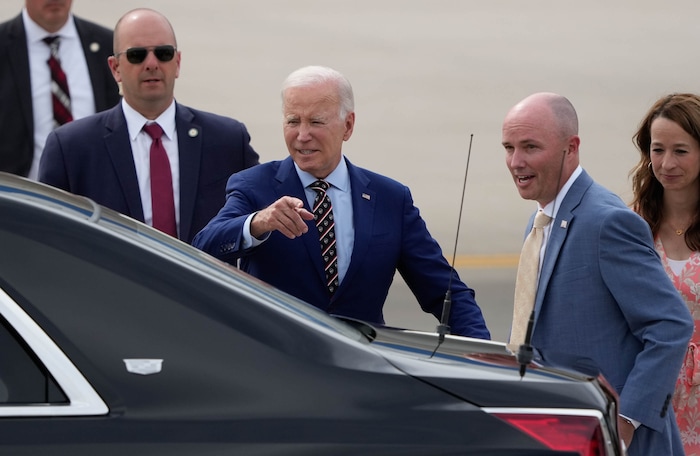 (Francisco Kjolseth | The Salt Lake Tribune) President Joe Biden directs Gov. Spencer Cox and his wife Abby to join  him in the motorcade after departing Air Force One and landing at Roland R. Wright Air National Guard Base, in Utah on Wednesday, Aug. 9, 2023.