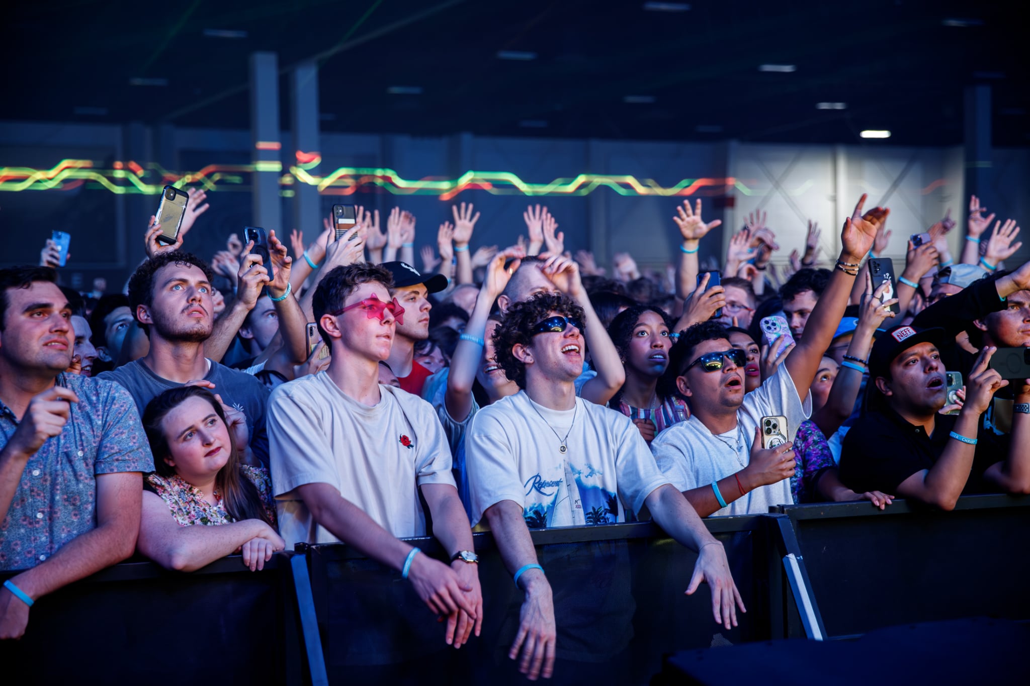 (The Church of Jesus Christ of Latter-day Saints) Young adults listen and dance as Kaskade performs at the Mountain American Expo Center in Sandy, Utah, on Friday, Aug. 11, 2023. A blogger is suggesting doing away with singles wards, especially for older members.