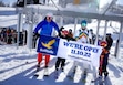 (Francisco Kjolseth | The Salt Lake Tribune) Shawn McPherron, left, joins Liz Dean and her two boys Rainier, 7, and Theodore, 5, for first chair as skiers and snowboarders enjoy opening day at Solitude Mountain Resort Thursday Nov. 10, 2022.