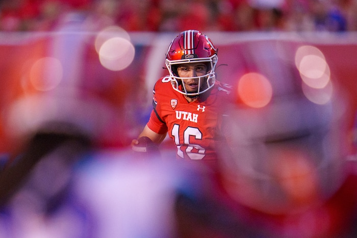 (Trent Nelson  |  The Salt Lake Tribune) Utah Utes quarterback Bryson Barnes (16) runs for a touchdown as the Utah Utes host the Florida Gators, NCAA football in Salt Lake City on Thursday, Aug. 31, 2023.