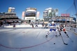 Buffalo Sabres center Sam Reinhart (23) battles for the puck with New York Rangers defenseman Brady Skjei (76) in the first period of the NHL Winter Classic hockey game at CitiField in New York on Monday, Jan. 1, 2018. (AP Photo/Adam Hunger)