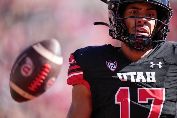 (Francisco Kjolseth  |  The Salt Lake Tribune) Utah Utes wide receiver Devaughn Vele (17) scores a touchdown as the Utah Utes host the Arizona State Sun Devils in NCAA football in Salt Lake City on Saturday, Nov. 4, 2023.