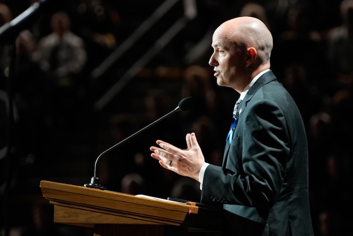 (Francisco Kjolseth  |  The Salt Lake Tribune) Utah Gov. Spencer Cox speaks during funeral services for Santaquin police Sgt. Bill Hooser at the UCCU Center at Utah Valley University on Monday, May 13, 2024.