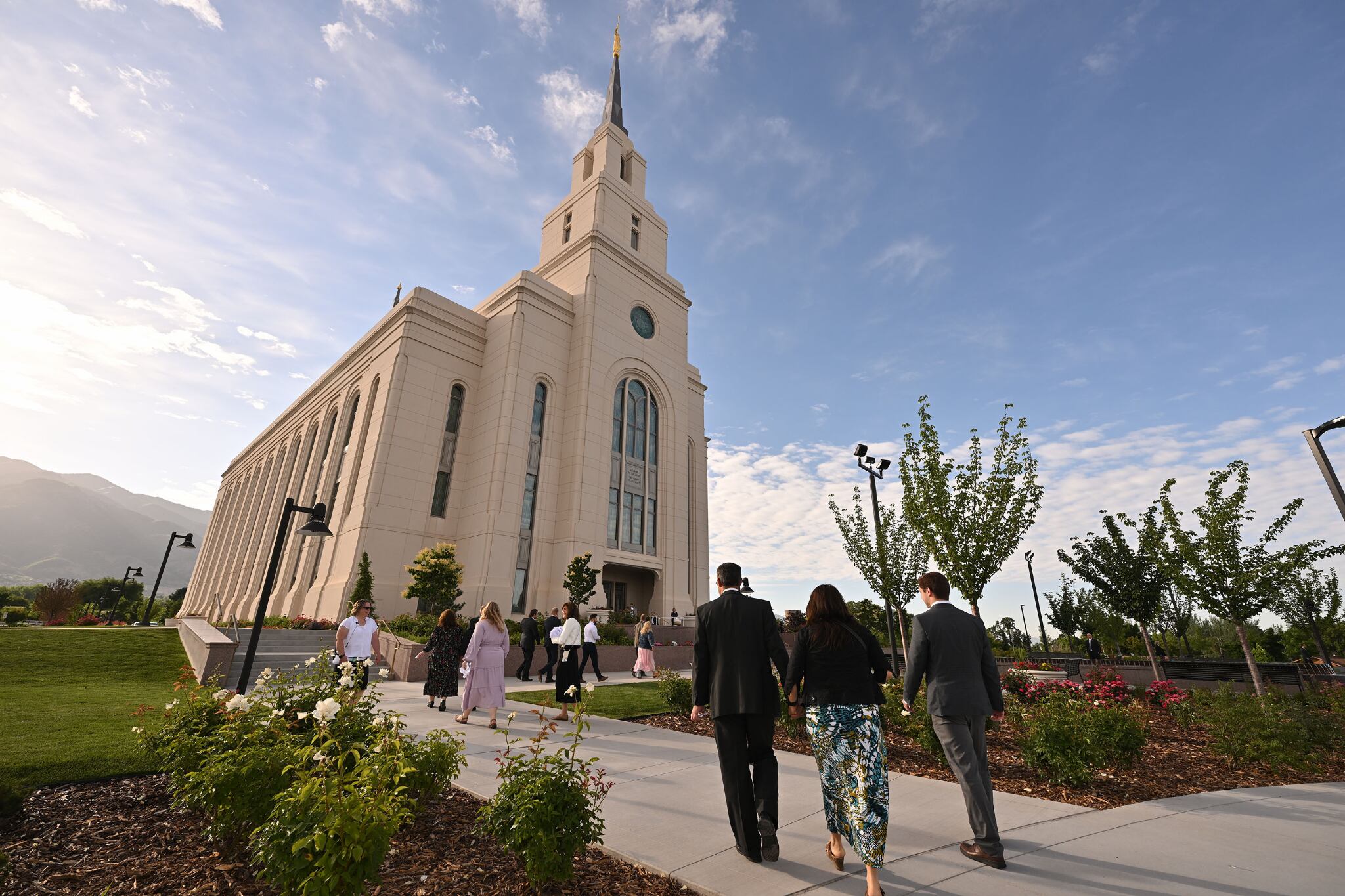 (The Church of Jesus Christ of Latter-day Saints) Latter-day Saints attending the dedication make their way into the Layton Utah Temple before its dedication by apostle David A. Bednar on Sunday, June 16, 2024.