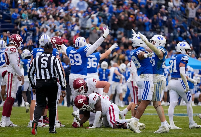 (Bethany Baker  |  The Salt Lake Tribune) Brigham Young Cougars celebrate a missed field goal by the Oklahoma Sooners at LaVell Edwards Stadium in Provo on Saturday, Nov. 18, 2023.