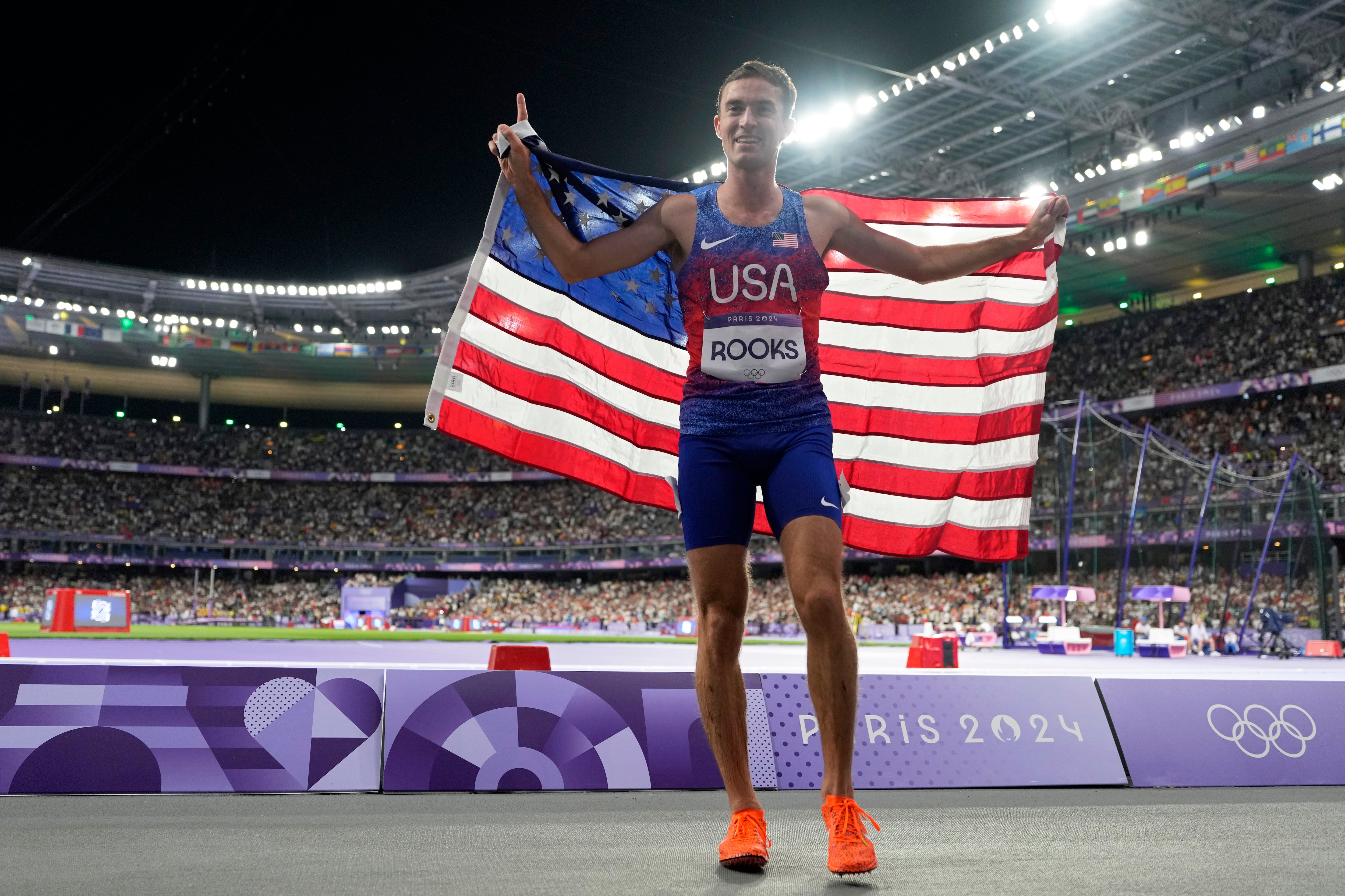 (Ashley Landis | AP) Kenneth Rooks celebrates his silver medal in the steeplechase at the 2024 Summer Olympics on Wednesday, Aug. 7, 2024, in Saint-Denis, France.