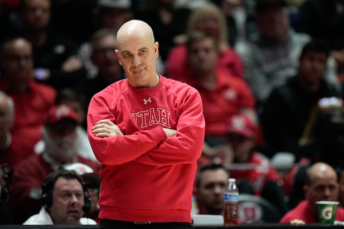 (Francisco Kjolseth  |  The Salt Lake Tribune) Utah basketball coach Craig Smith keeps an eye on the action in PAC-12 basketball between the Utah Utes and the Arizona Wildcats at the Jon M. Huntsman Center, on Thursday, Feb. 8, 2024.