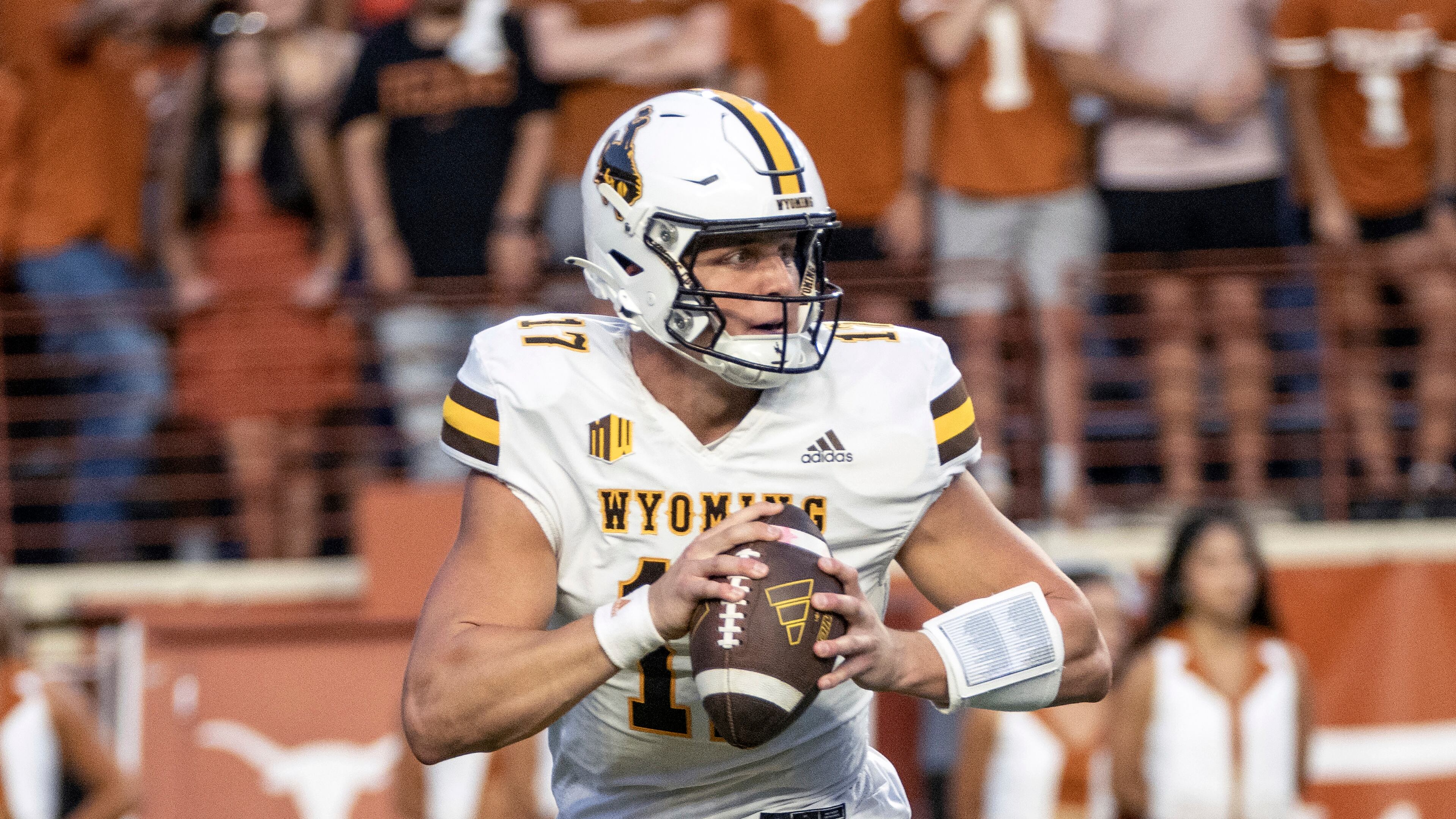 Wyoming quarterback Evan Svoboda looks to pass during the first half of an NCAA college football game against Texas, Saturday, Sept. 16, 2023, in Austin, Texas. (AP Photo/Michael Thomas)