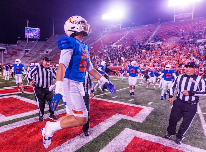 (Rick Egan | The Salt Lake Tribune)   The Timpview Thunderbirds celebrate their 5A State Championship over the Bountiful Redhawks, at Rice-Eccles Stadium, on Friday, Nov. 17, 2023.
