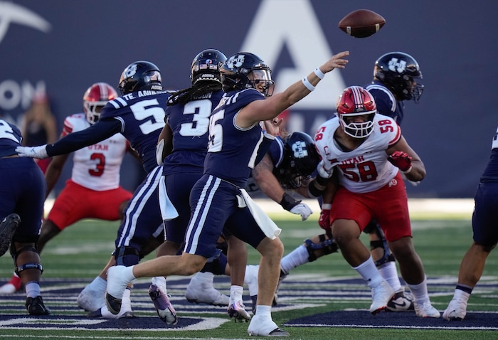 (Francisco Kjolseth  | The Salt Lake Tribune) Utah State Aggies quarterback Jacob Conover (15) makes a pass as Utah State hosts the University of Utah during the second half of an NCAA college football game Saturday, Sept. 14, 2024, in Logan, Utah.