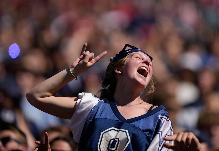 (Francisco Kjolseth  | The Salt Lake Tribune) Aggies fans cheer on their team as Utah State hosts the University of Utah during the first half of an NCAA college football game Saturday, Sept. 14, 2024, in Logan, Utah.