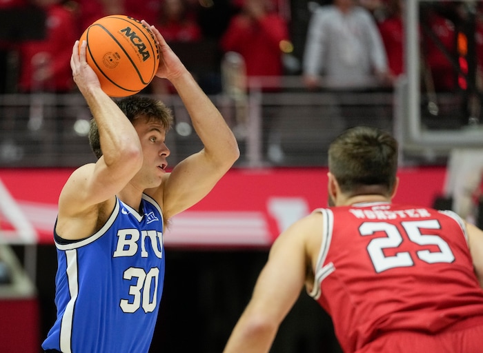 (Bethany Baker  |  The Salt Lake Tribune) Brigham Young Cougars guard Dallin Hall (30) looks to pass the ball at the Jon M. Huntsman Center in Salt Lake City on Saturday, Dec. 9, 2023.