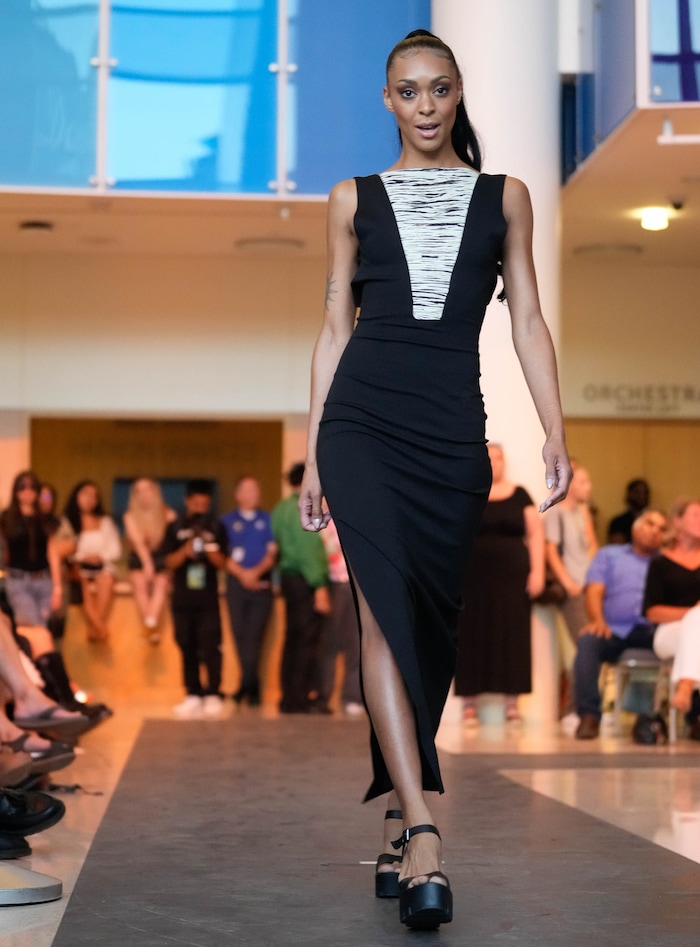 (Francisco Kjolseth | The Salt Lake Tribune) Marisa Cannon walks the runway at the Eccles Theater on Friday, July 21, 2023, and fashion and hip-hop artist join forces for and indoor outdoor event called Main Street: A Fashion and Music Experience. 