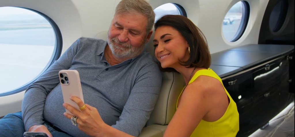 (Bravo) Todd Bradley, left, and his wife, Bronwyn Newport, share a moment as they fly with the group to Palm Springs, on an episode of "The Real Housewives of Salt Lake City."