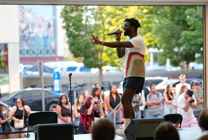 (Francisco Kjolseth | The Salt Lake Tribune) Vocalist Gavanni sings at the Eccles Theater on Friday, July 21, 2023, while paired with fashion designer Hookchute for a free show, called Main Street: A Fashion and Music Experience.