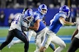 (Bethany Baker  |  The Salt Lake Tribune) Brigham Young Cougars tight end Ray Paulo (42) defends against Kansas Jayhawks linebacker Cornell Wheeler (44) during the game against the Kansas Jayhawks in Provo on Saturday, Nov. 16, 2024.