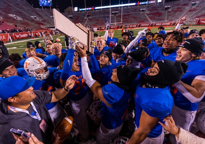 (Rick Egan | The Salt Lake Tribune)   The Timpview Thunderbirds celebrate their 5A State Championship over the Bountiful Redhawks, at Rice-Eccles Stadium, on Friday, Nov. 17, 2023.
