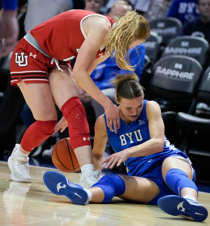 (Francisco Kjolseth  | The Salt Lake Tribune) Utah Utes guard Gianna Kneepkens (5) tumbles with BYU Cougars guard Amari Whiting (1) as BYU hosts Utah, NCAA basketball in Provo on Saturday, Jan. 25, 2025.