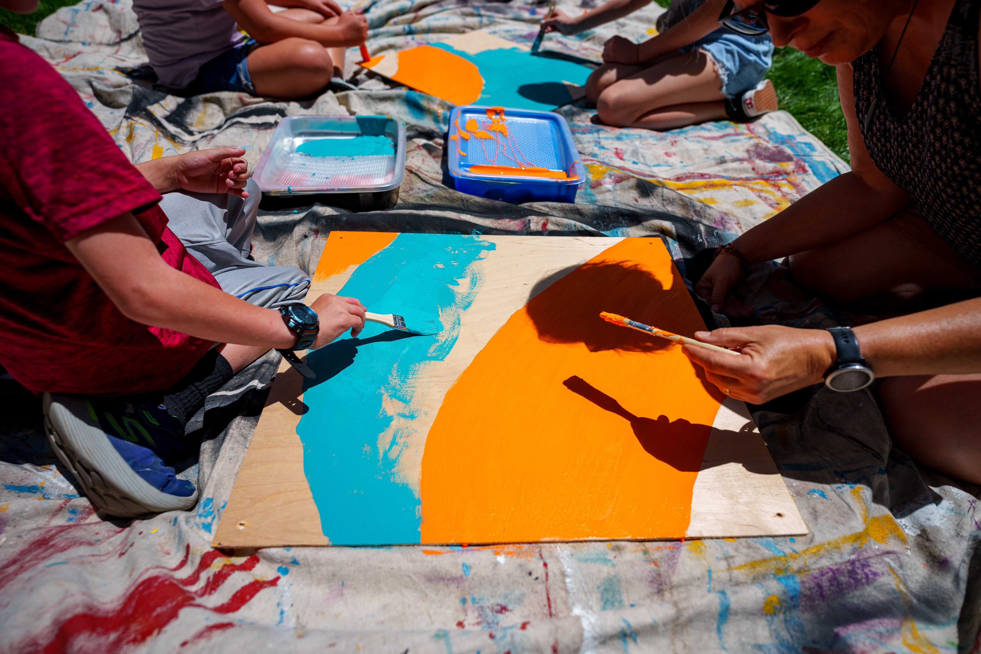 (Trent Nelson | The Salt Lake Tribune) Squares are painted for the 100/ONE project at the Utah Arts Festival in Salt Lake City on Friday, June 28, 2024.